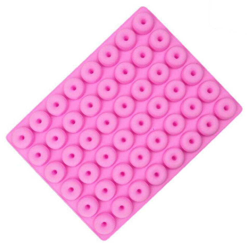 Mini pink donuts kageform