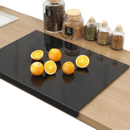 Skridsikkert skærebræt i gennemsigtig sort akryl.