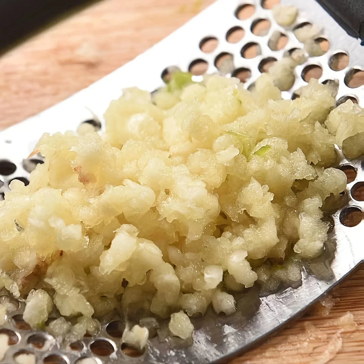 Vippende hvidløgspresser