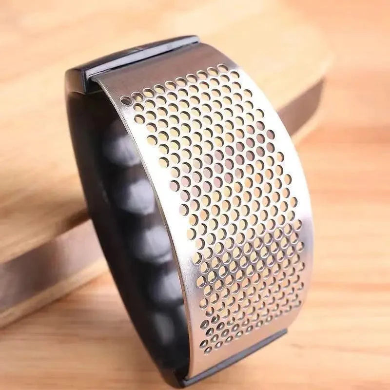 Vippende hvidløgspresser