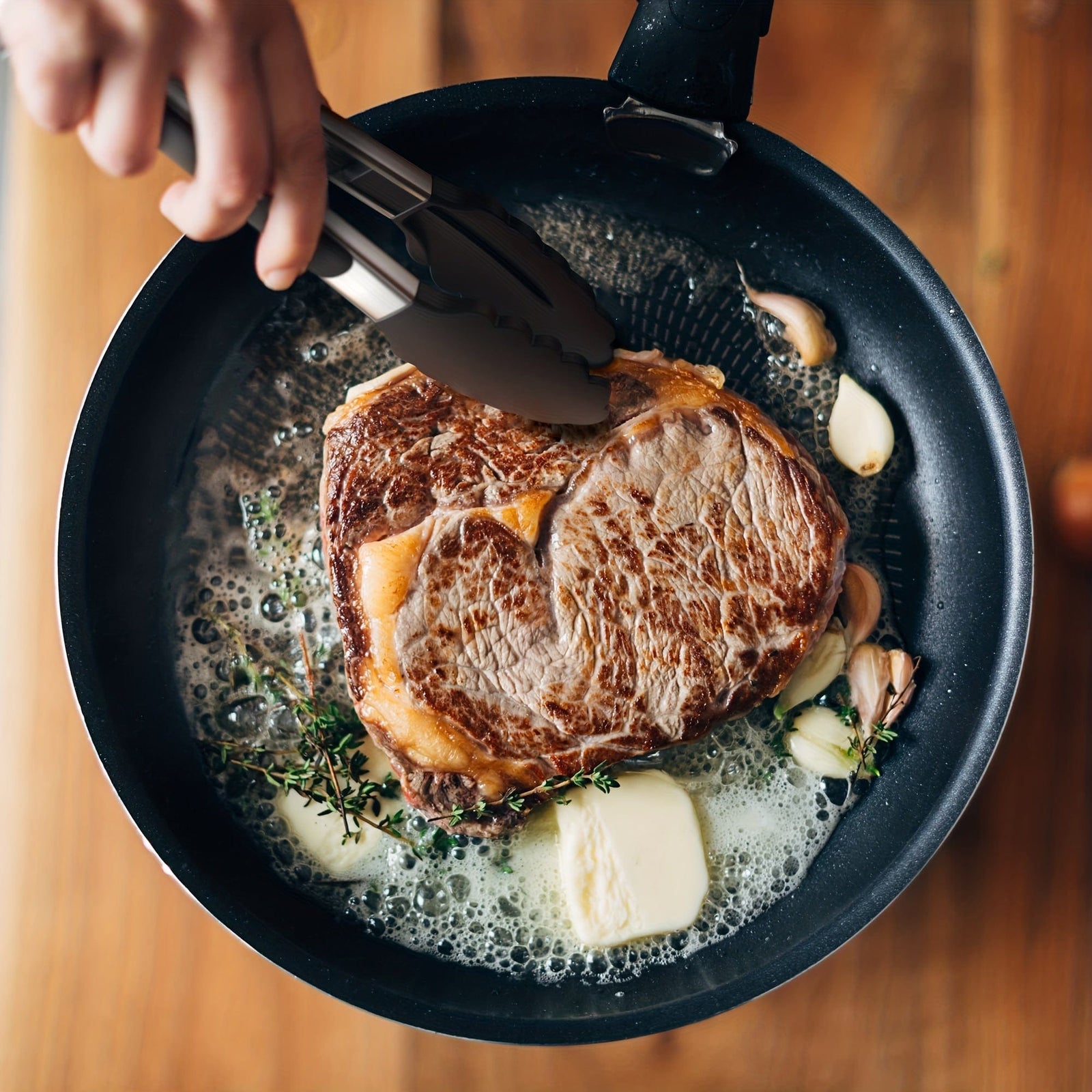 Køkkenflip-flop i rustfrit stål med sorte silikonespidser