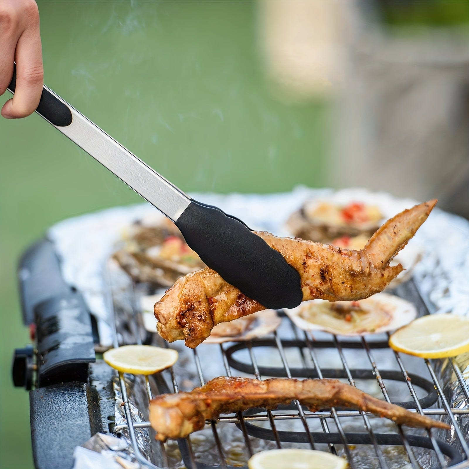 Køkkenflip-flop i rustfrit stål med sorte silikonespidser